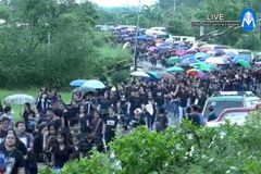 Sea of black as thousands flock to slain priest’s funeral