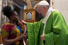 Migrants are people, not just a social issue, pope says at Mass