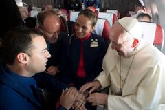 Pope marries couple on flight during Chilean trip