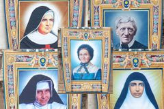 Banners unfurled as faithful share stories of five saints