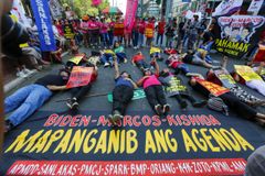 Climate activists in Manila hit Washington’s trilateral summit