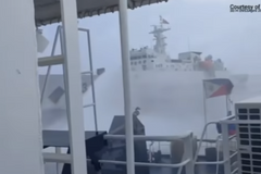 Philippines says China Coast Guard used water cannon on its vessels