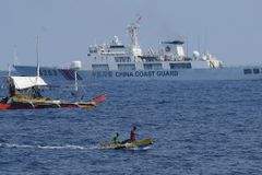 Philippine boat convoy won’t proceed to China-held reef: organisers