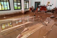 Church volunteers race to clear mud in wake of northern Thailand’s historic floods