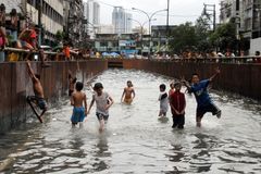 Disaster victims gather, urge Philippine government to prioritize people over profit