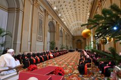 Pope Francis warns against gossip, celebrates family life in Vatican Christmas messages