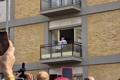Blessing the crowd outside Gemelli Hospital, Pope Francis makes first public appearance in weeks