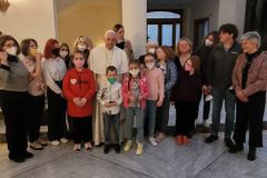 Pope Francis greets Ukraine war refugees before first papal flight of 2022