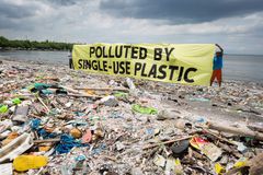 Activists decry ‘greenwashing’ in Philippine government’s plastic road initiative