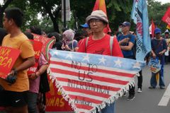 Women’s group urges end to foreign military presence on Independence Day