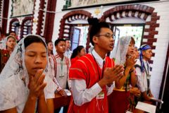 Pope, as ‘grandfather,’ urges Myanmar’s young to love and serve
