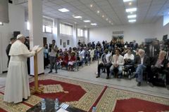 Pope Francis to migrants: The Church suffers with you