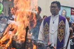 Priest who defied Duterte’s drug war wins Asia’s ‘Nobel Prize’