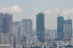 Corruption scandal, climate disruptions drag Philippine growth to 14-year low