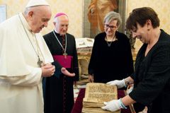 Pope Francis presented with historic prayer manuscript saved from Islamic State