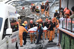 Philippine construction collapse toll hits four, over dozen missing