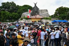 Thousands from Philippine sect protest pro-Duterte senator’s graft case