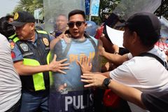 Media security task force condemns attempted arrest of veteran photojournalist at ASEAN protest